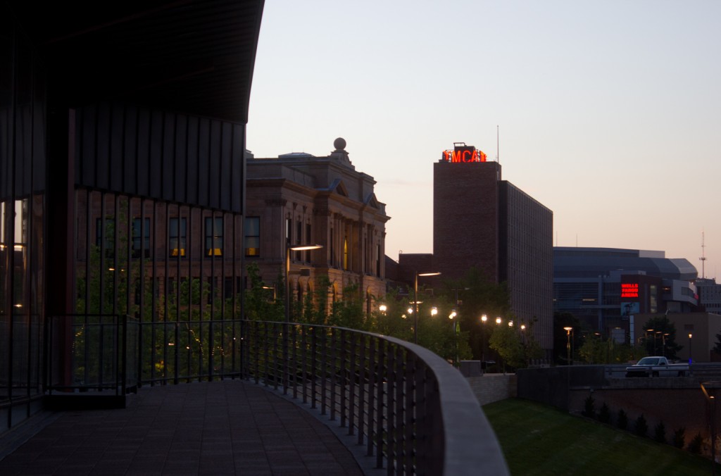 Sunset near the Des Moines Riverwalk and YMCA building in the background